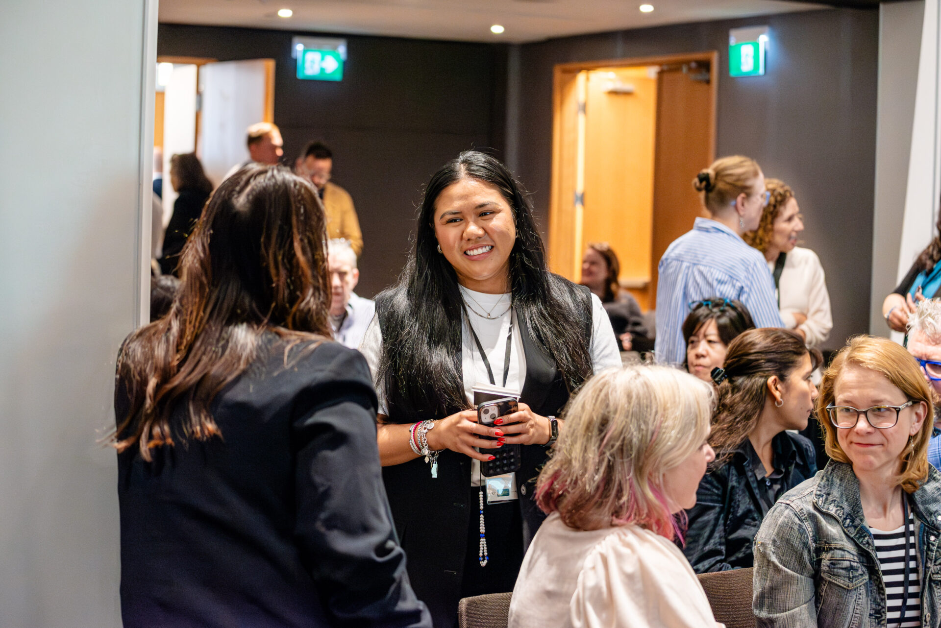 Attendees networking and connecting during a break at the C-Suite Marketing Summit.